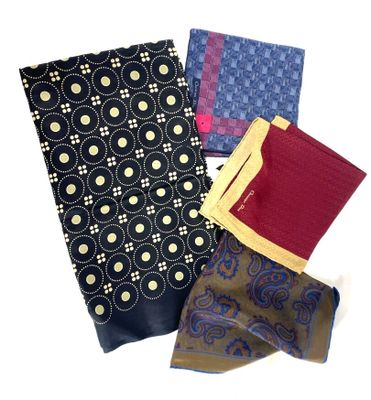several different types of ties are laid out on a white surface