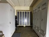 an image of a hallway with lockers in a building