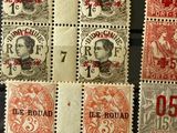 a close up of a group of stamps on a table