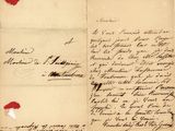 un gros plan d'un morceau de papier sur lequel on a écrit