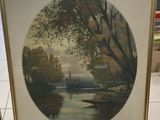 tableau encadré représentant une scène fluviale avec des arbres en arrière-plan