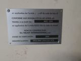 a sign that is attached to the wall of a building