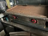 an old stove that is sitting in a kitchen