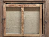 an old picture frame with a picture of a window in it
