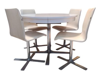 a picture of a white table and four chairs