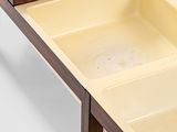 a wooden table with a drawer on top of it
