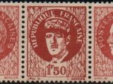 a stamp with three heads of men on them on a black background