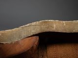 a piece of wood that is sitting on top of a table
