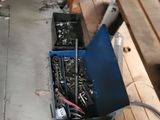 a picture of a workbench with tools in it