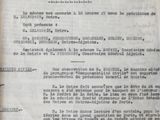 an old document with writing on it sitting on a table