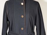 an image of a black coat on a mannequin mannequin