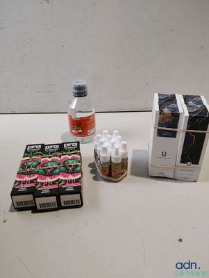 a bottle of water, a box of cigarettes, and a box of cigarettes