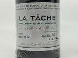 a bottle of wine that is sitting on a table
