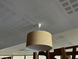 a lamp that is hanging from the ceiling in the room