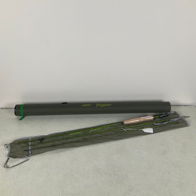 an image of a pair of fishing rods sitting on top of a table