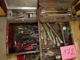 a box full of tools that are sitting on the floor