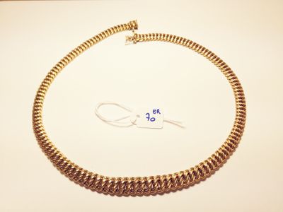 gold plated chain necklace with a clasp on a white surface