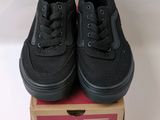 vans old skool shoes in a box on a white surface