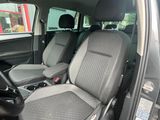 the interior of a car with two seats and a steering wheel