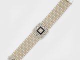 un bracelet de montre Art déco orné de perles et de diamants