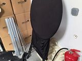 a chair that is sitting next to a fire extinguisher