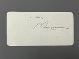 an autograph of a person ' s signature on a white card