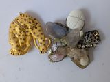 a leopard brooch and a leopard brooch sitting next to each other