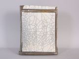 silver and white cracky glass vase with a cracky surface