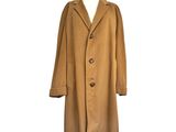 une photo d'un manteau marron sur un mannequin