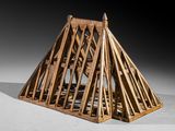 an image of a wooden structure with a roof made out of wood