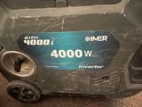 the back end of a lawn mower with the number 4, 000 watt on it