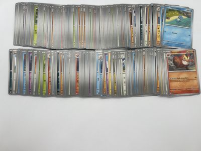 several cards are stacked on top of each other on a table