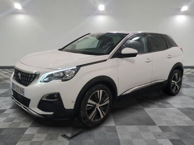 the white car is parked in a large room with a checkered floor