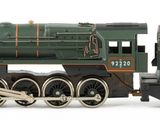 a toy train that is sitting on a white surface