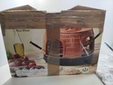 une boîte sur laquelle est représenté un four à pizza