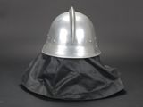 a helmet that is sitting on top of a black cloth