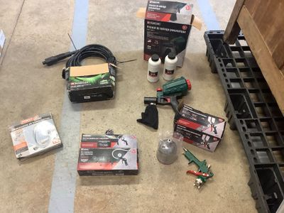 a lot of tools that are sitting on the floor