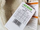 a close up of a stuffed animal with a price tag on it