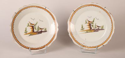 pair of antique hand painted porcelain plates with birds and flowers on them