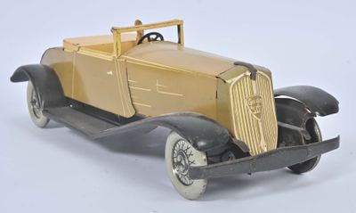 une voiture jouet posée sur une surface blanche