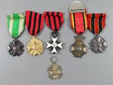 several medals and medals are displayed on a table