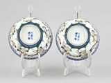 pair of chinese porcelain dishes on stands