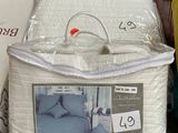 a box of pillows and a pillow case on a table