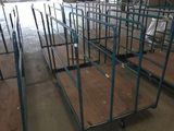 a large warehouse with a lot of tables in it