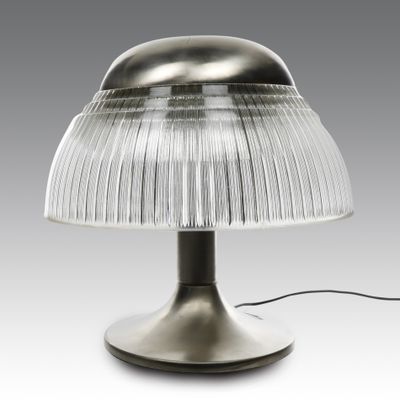 an image of a table lamp with a glass shade on top of it