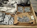 a box full of different types of screws and nuts
