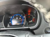 a close up of a car dashboard with a speedometer