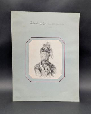 a black and white photo of a man in a feathered headdress