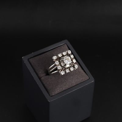 an image of a diamond ring in a black box on a black background