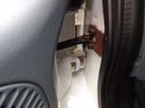 a close up of a door handle in a car